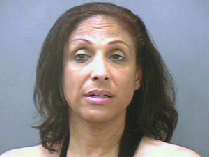 Woman sought for assaulting cops with stolen car
